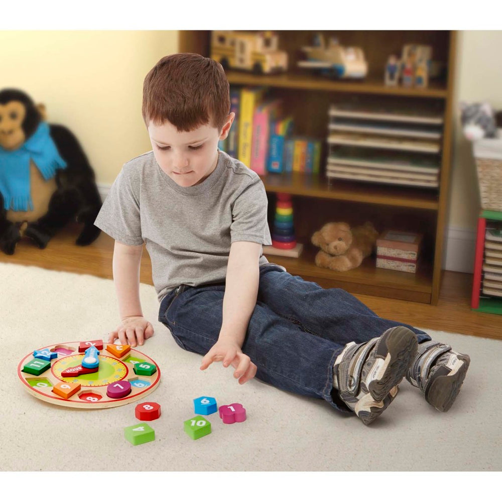 Melissa doug wooden learning clock with 12 wooden shapes