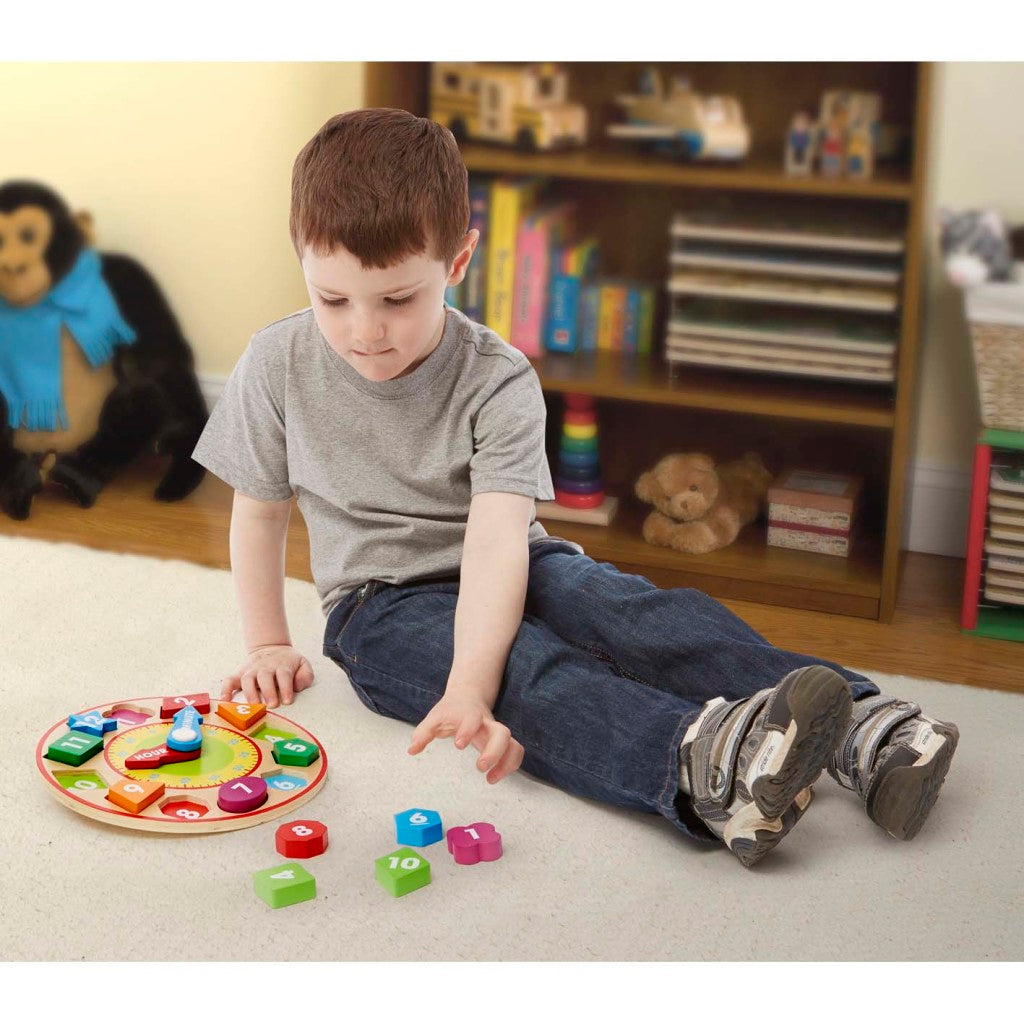 Melissa doug wooden learning clock with 12 wooden shapes