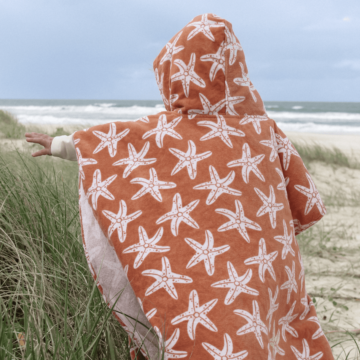 Seastar | orange beach poncho 65 x 65 cm