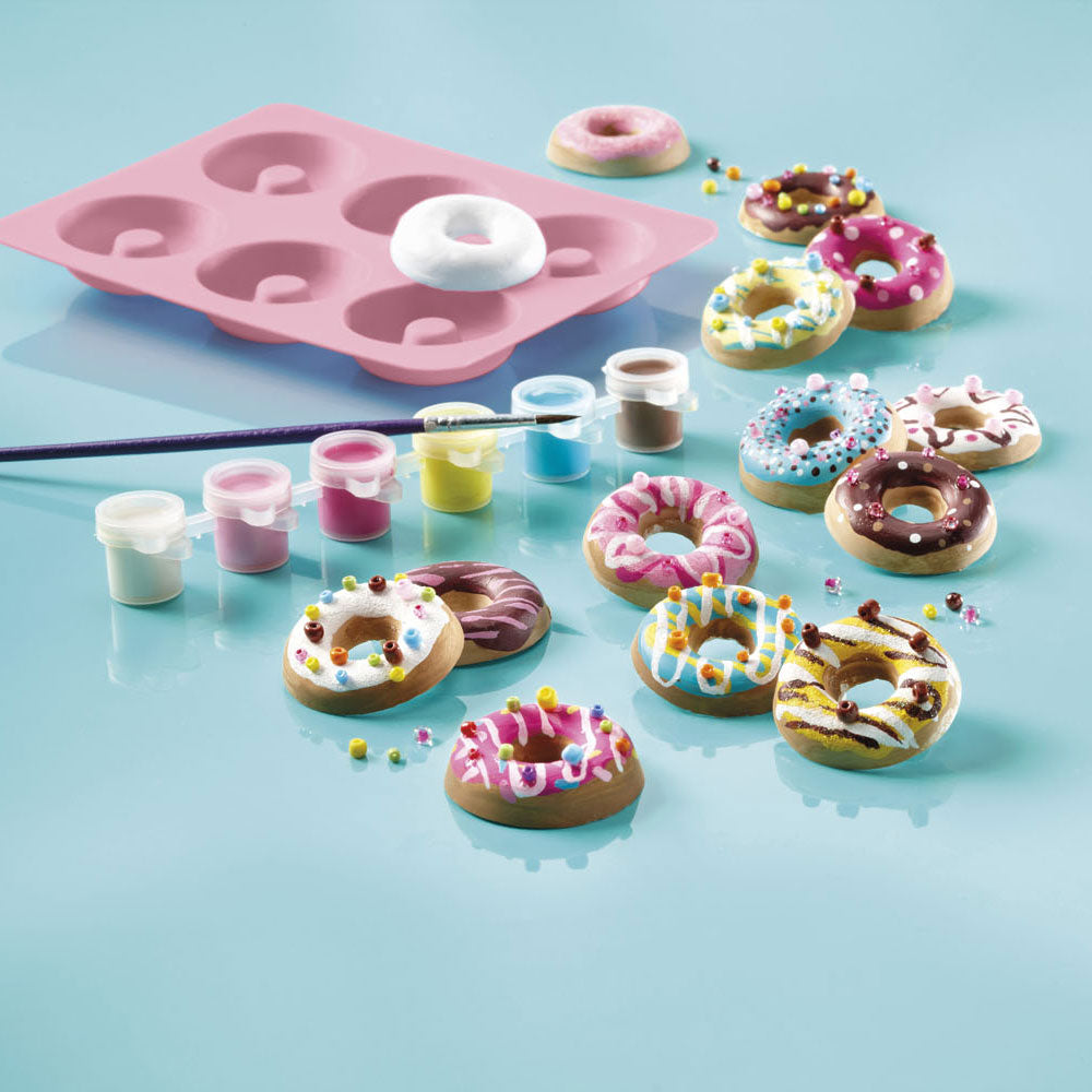 Pour and decorate all donuts