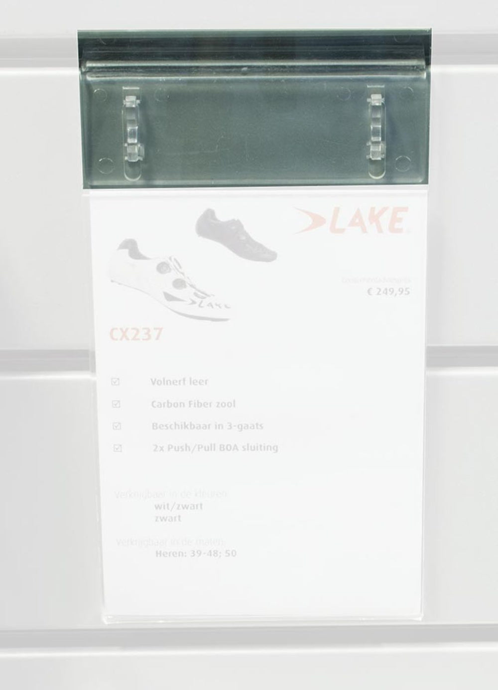 Unbranded shelving unit, hanging card holder, slat wall