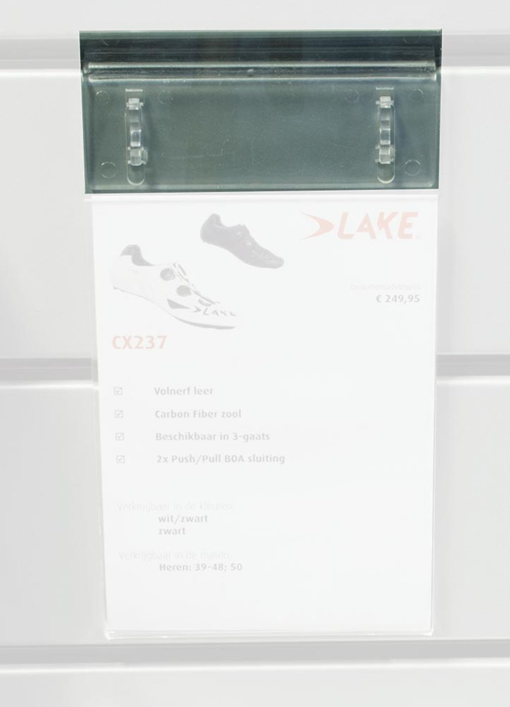 Unbranded shelving unit, hanging card holder, slat wall