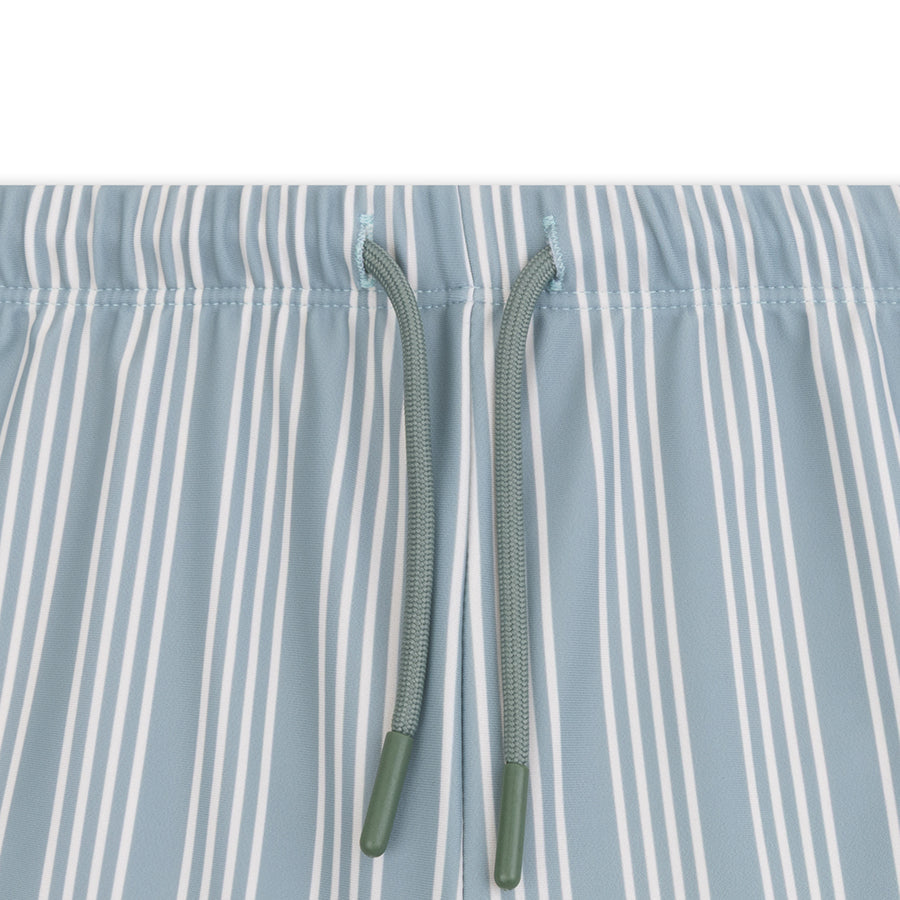 Resort stripe | green UV swimming trunks boys