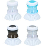 Washing -up brush with reservoir
