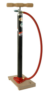 Bomba de bicicleta na prancha de madeira com Dunlop Valiel