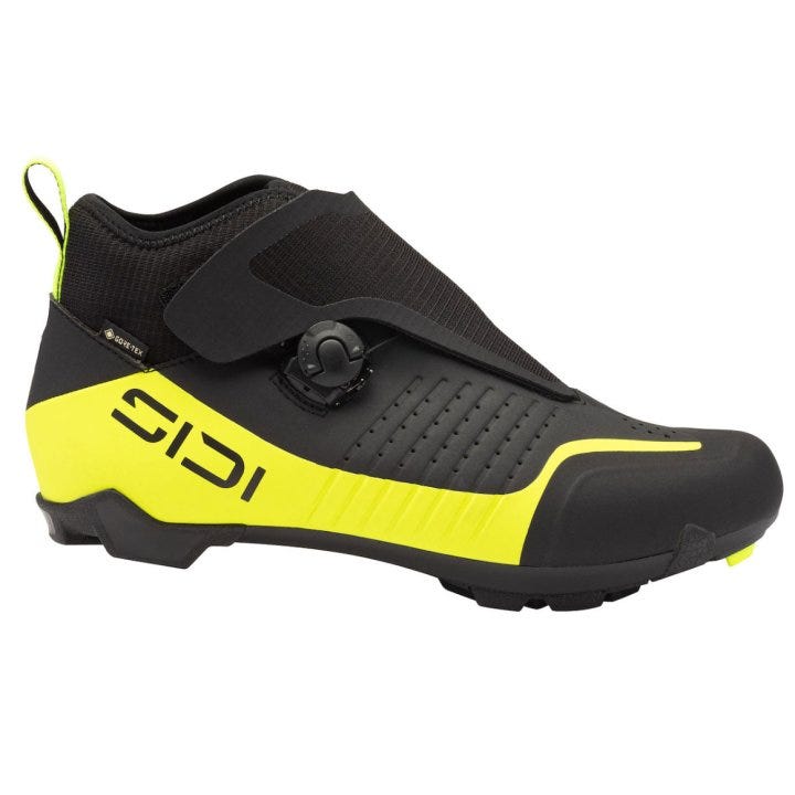 Abby's shoes are black, yellow, and neon.