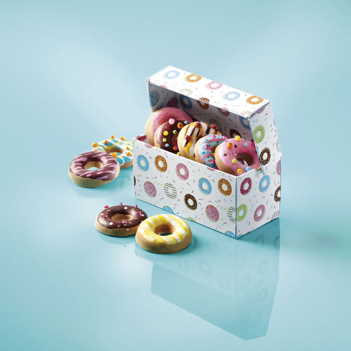 Totum donuts heller og dekorerer