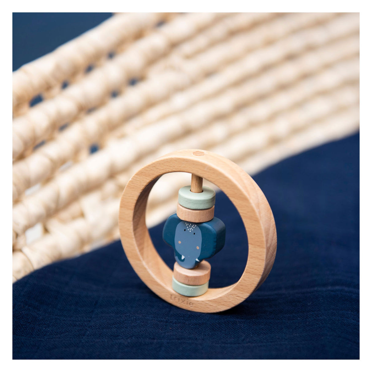 Trixie wooden rattle around Mrs. Elephant