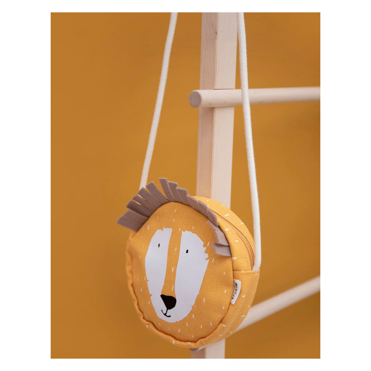 Trixie shoulder bag around Mr. Lion