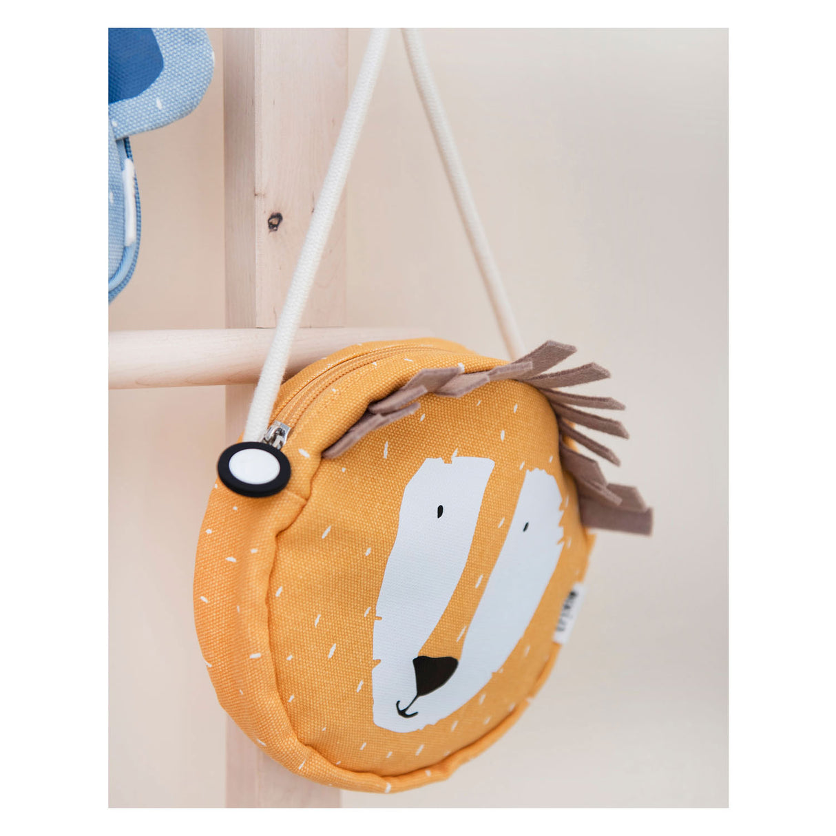 Trixie shoulder bag around Mr. Lion