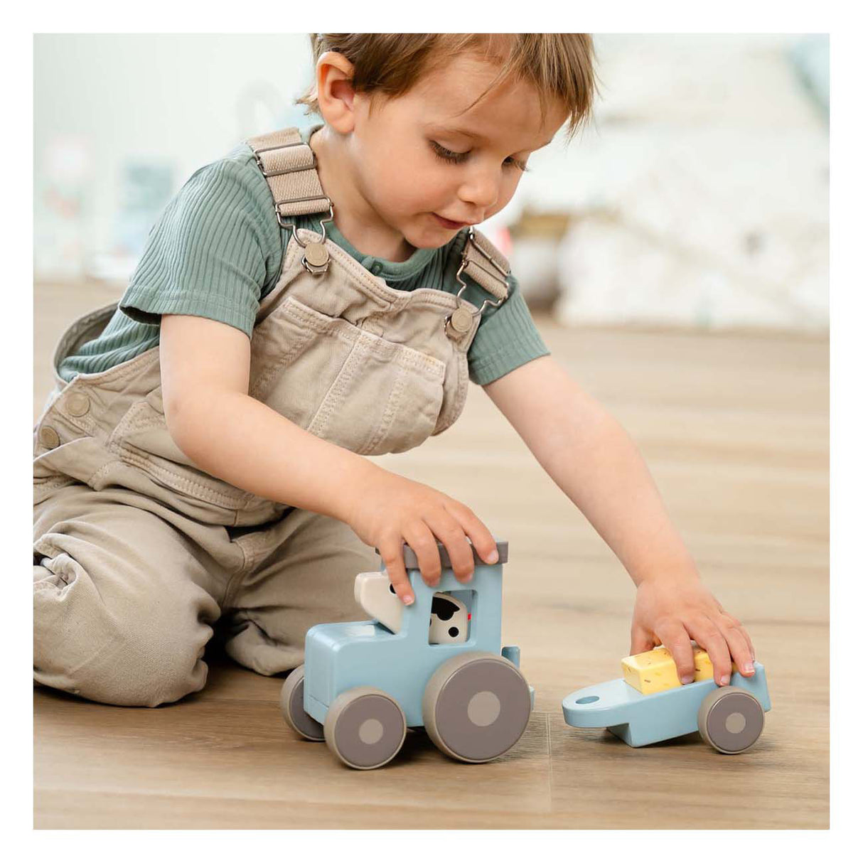 Done by deer tiny farm houten tractor dotti blauw