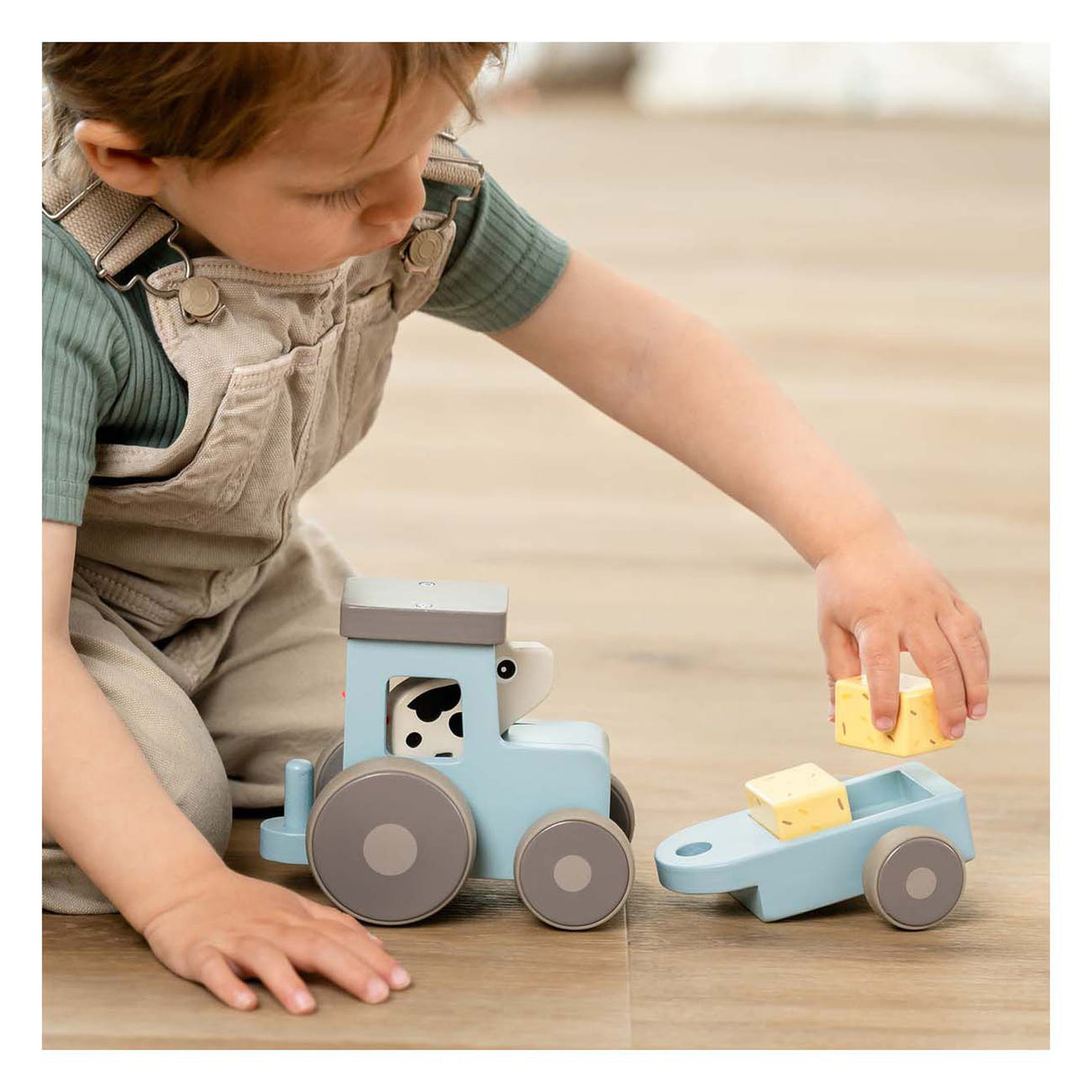 Done by deer tiny farm houten tractor dotti blauw