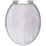 Asiento de inodoro Schütte con madera clara de color claro MDF