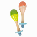 Pequenos pés de madeira maracas groovy batidas