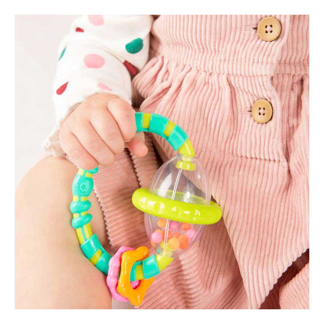 Chwyć i obróć grzechotkę i ząbkowaną zabawkę