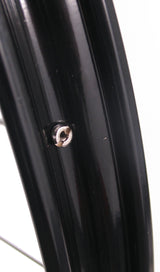 Front wheel 28 x 1 1 2 aluminum rim chromed hub black