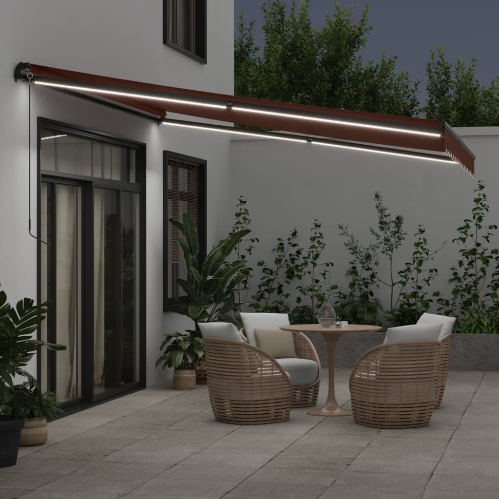 Vidaxl Luifel estendibile manualmente con LED 400x300 cm marrone