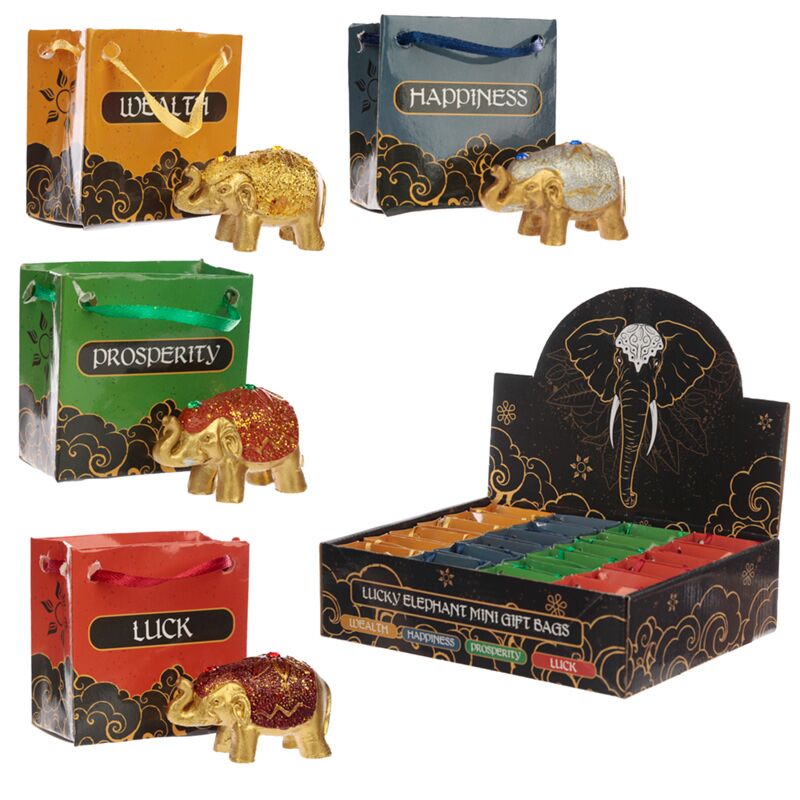 Lyckoelefant i metallisk glitter i en väska