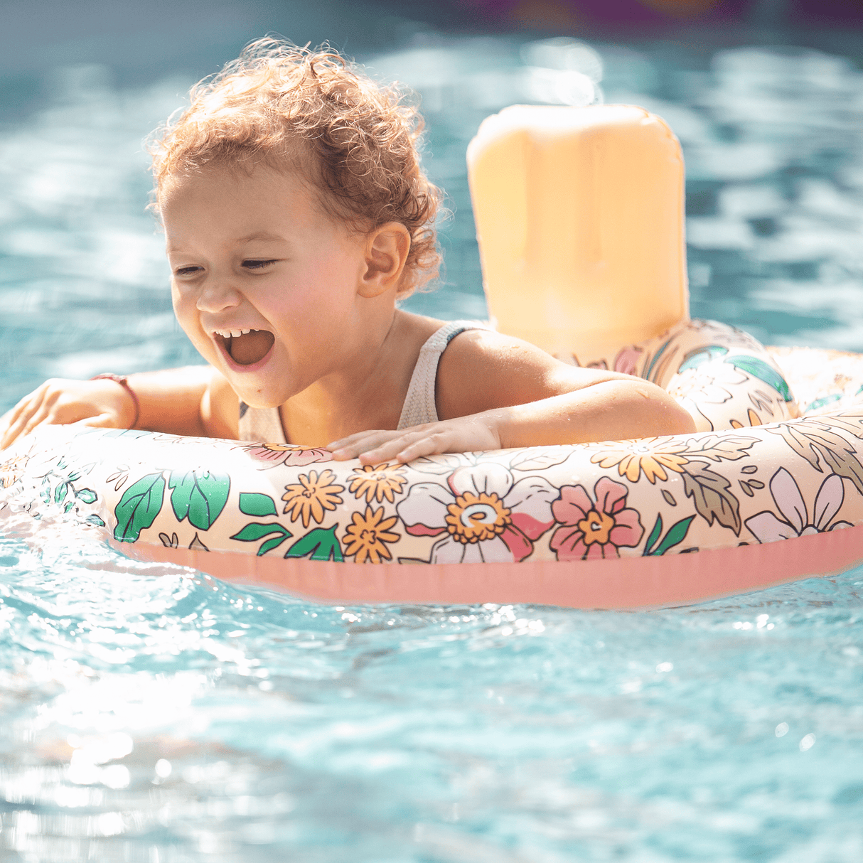 Blossom | multicolored baby float 0-1 years