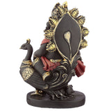 Ganesh statue with pipe and peacock cock