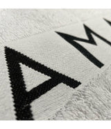 Farmavita amaro towel with logo