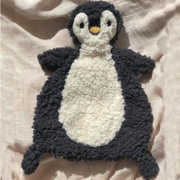 Petú Petú Petú Petú huet Sherpa Küple Stoff Pinguin